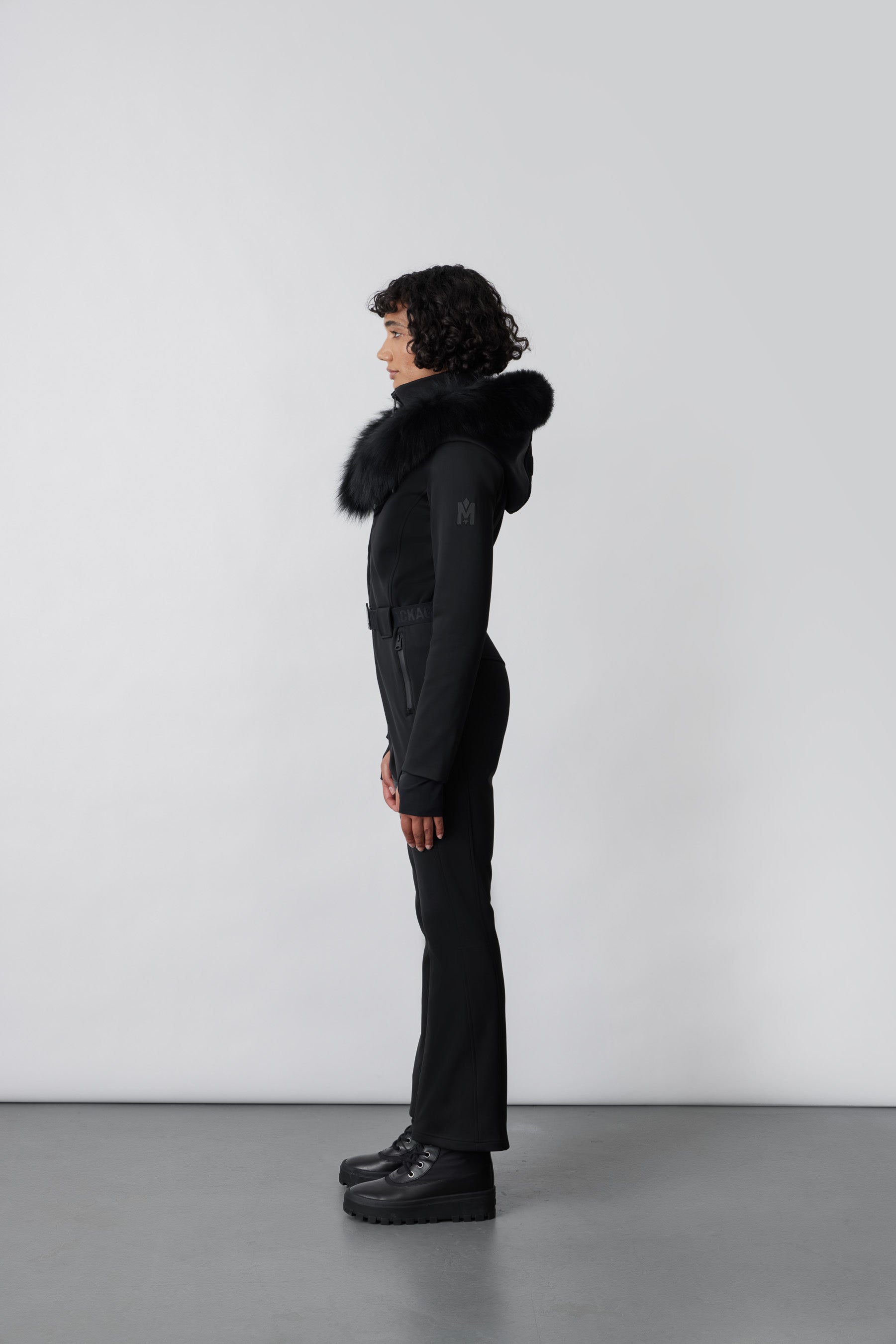 Elle, Techno fleece ski suit with removable hood and fur